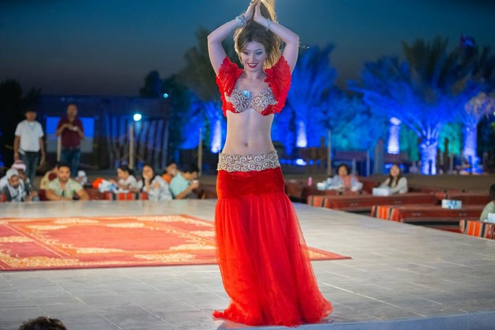 Immerse yourself in the magic of Dubai's desert where the grace of belly dance and the warmth of a BBQ dinner combine for an unforgettable evening under the stars.